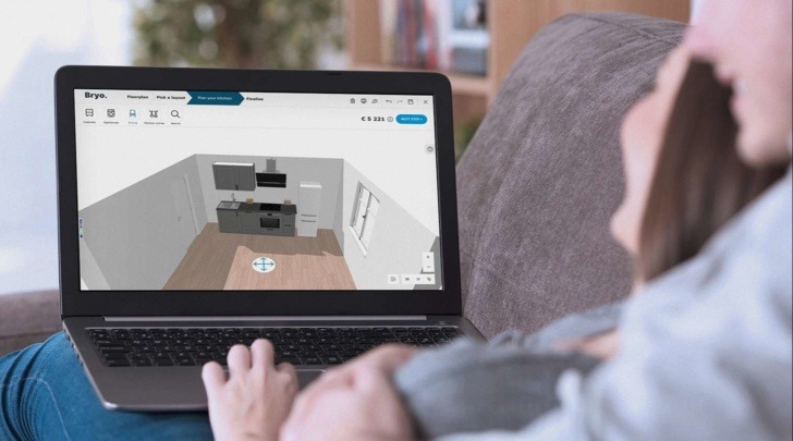 couple designing a kitchen with HomeByMe for kitchen retailers 3D planning solution