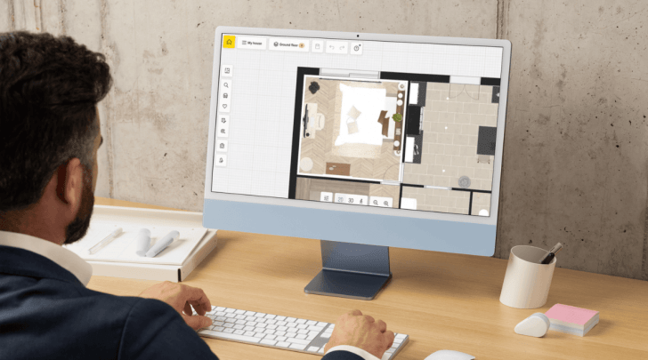 Designing a house floor plan using the 3D HomeByMe software.