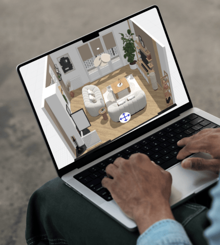 A person working with the HomeByMe 3D modeling software